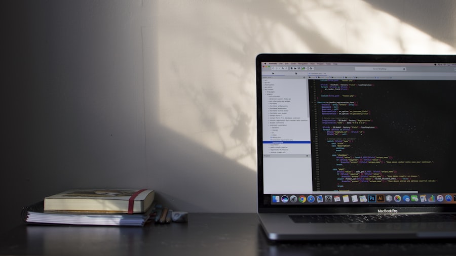Code editor open on a laptop in a sunlit room